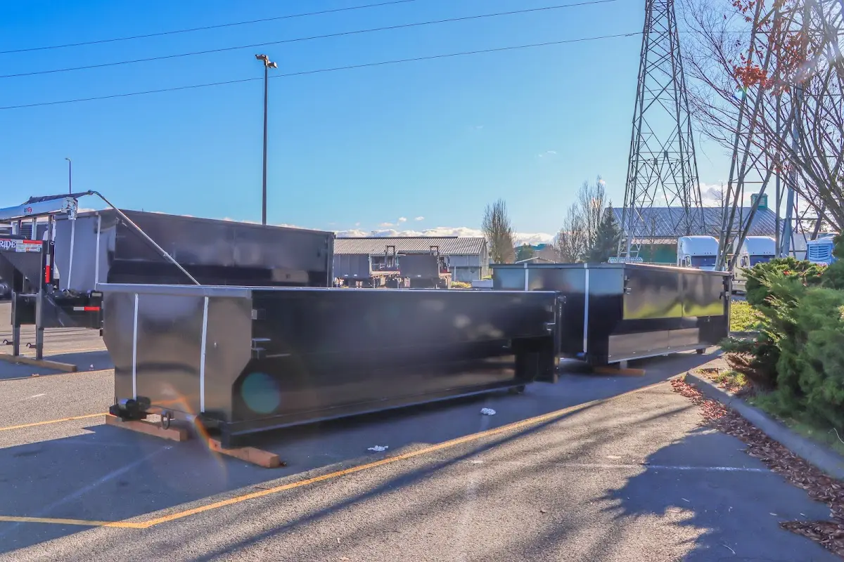 Roll-off dumpster ready for waste disposal at job site for 6 Yard Dumpster Rental in Wakefield